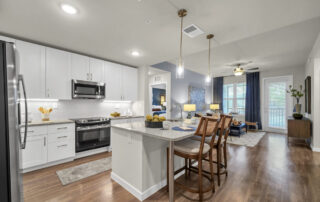 A chef's kitchen with a breakfast bar from Parkside Punta Gorda